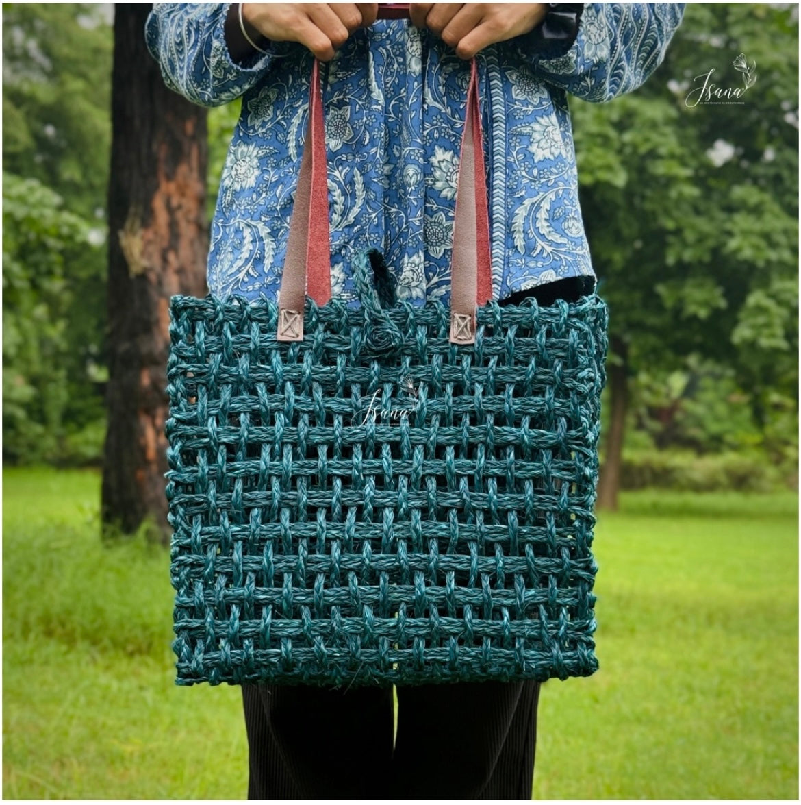 Neerja Sabai Tote – Handwoven Mesh Cane Bag in Teal